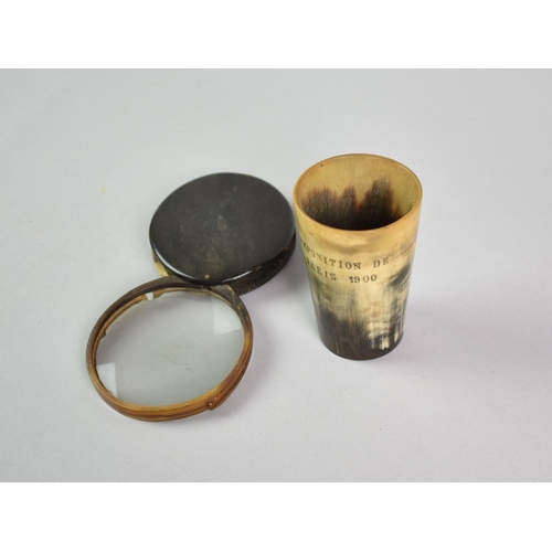 56 - A Horn Beaker inscribed 'Exposition Du Paris 1900' together with an Oval Magnifying Glass