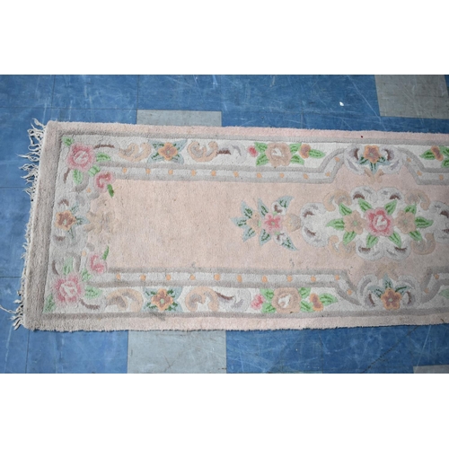 543 - A Chinese Patterned Woollen Runner, 230x70cms