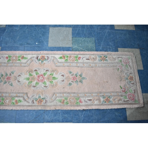 543 - A Chinese Patterned Woollen Runner, 230x70cms