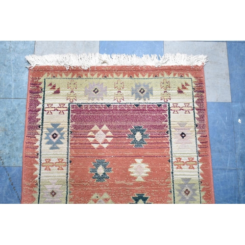 544 - A Patterned Hearth Rug, 136x80cms