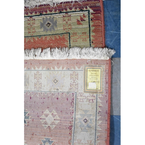 544 - A Patterned Hearth Rug, 136x80cms