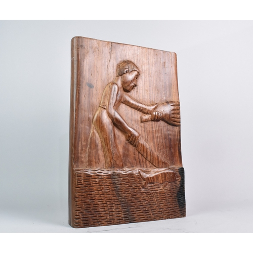 119 - A Heavy Section of African Timber Carved in Relief with Fishermen either Side, 37 X 25cm