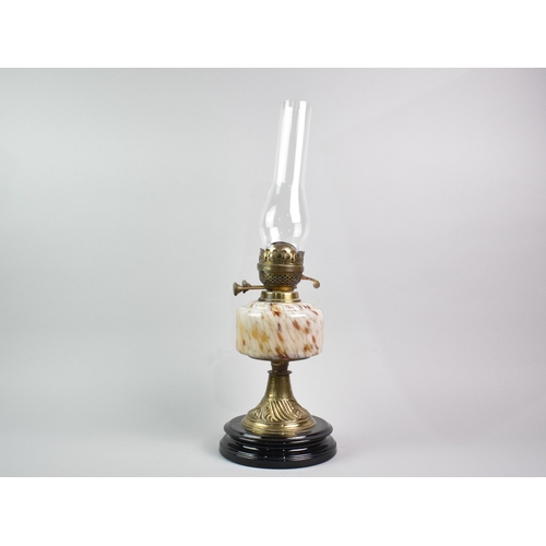 41 - A Late Victorian Oil Lamp with Coloured Glass Reservoir and Brass Base, 54cm High Overall