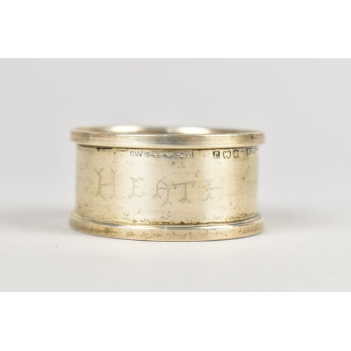 411 - A Silver Napkin Ring with Monument Obelisk Decoration by Henry Griffith & Sons Ltd, Birmingham