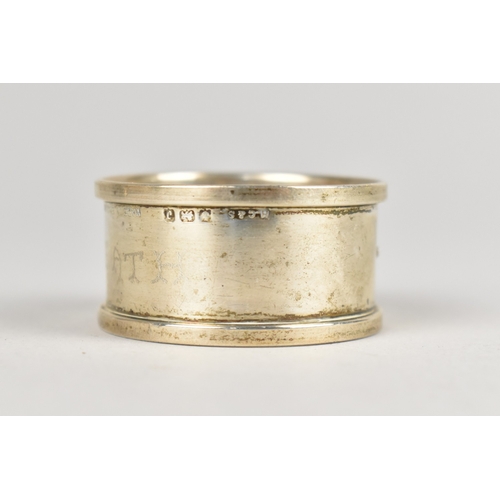 411 - A Silver Napkin Ring with Monument Obelisk Decoration by Henry Griffith & Sons Ltd, Birmingham