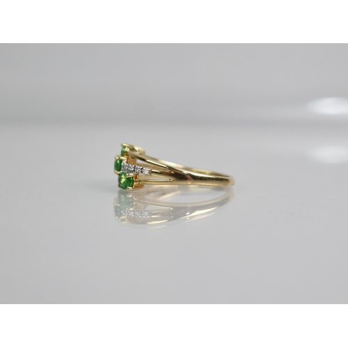 427 - A 9ct Gold, Tourmaline and Green Topaz Three Row Dress Ring, Three Matched Oval Cut Stones Measuring... 