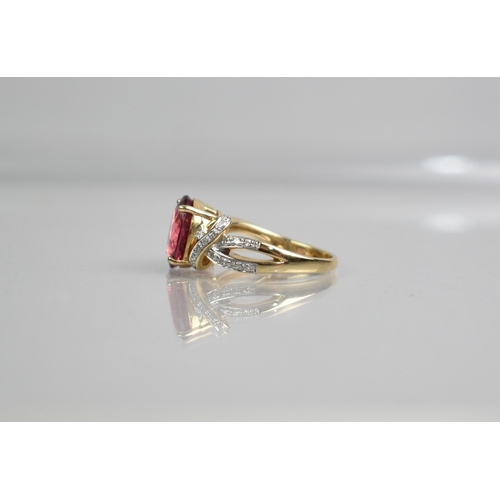 428 - A 9ct Gold, Diamond and Pink Topaz Type Stone Dress Ring (Untested), Central Stone Measuring 8.9mm b... 