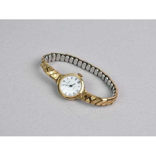 439 - A 9ct Gold Cased Excalibur Wrist Watch, White Dial with Roman Numerals, Case Measuring 19.4mm Diamet... 