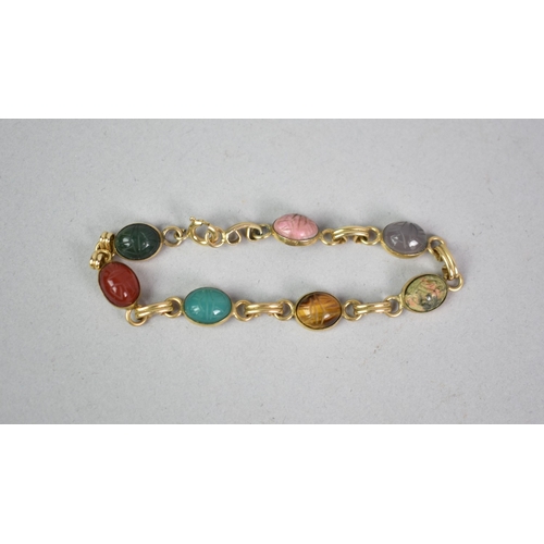 444 - A Scarab Bracelet in 12ct Gold Plate Set with Seven Amulets of Seven Precious Gems, 18cm Long