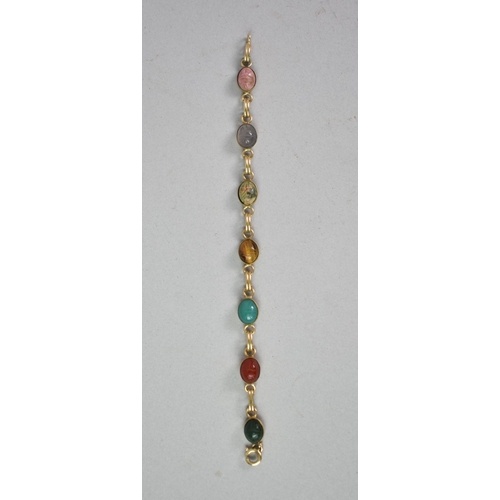 444 - A Scarab Bracelet in 12ct Gold Plate Set with Seven Amulets of Seven Precious Gems, 18cm Long