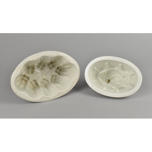 54 - Two Late 19th Century White Glazed Jelly Moulds