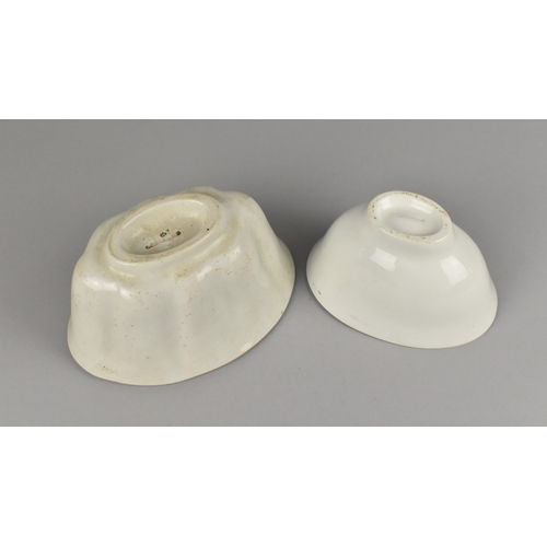 54 - Two Late 19th Century White Glazed Jelly Moulds