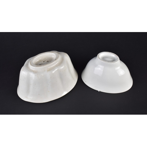 54 - Two Late 19th Century White Glazed Jelly Moulds