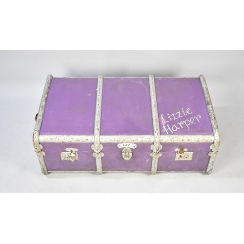 551 - A Painted Metal Banded Travelling Trunk, with Label 