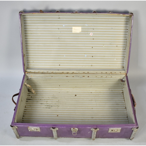 551 - A Painted Metal Banded Travelling Trunk, with Label 