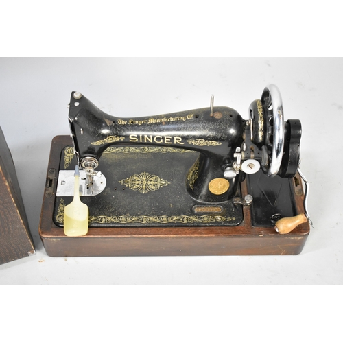 559 - A Manual Singer Sewing Machine, In Case