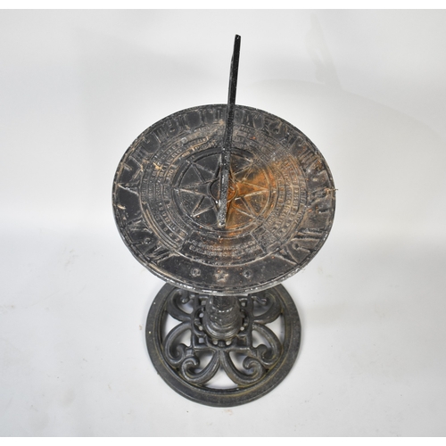 560 - A Black Painted Cast Metal Sundial, 81cm high