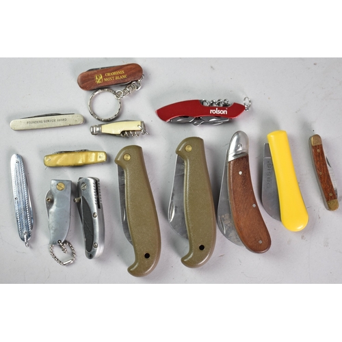 84 - A Collection of Various Pocket and Multitool Knives