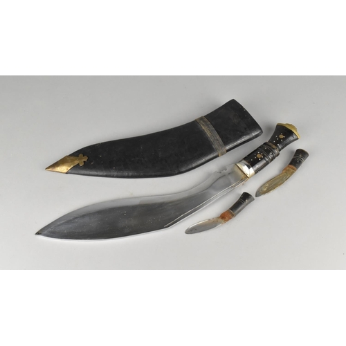 91 - A Vintage Kukri Knife with Two Daggers in Brass Mounted Leather Scabbard