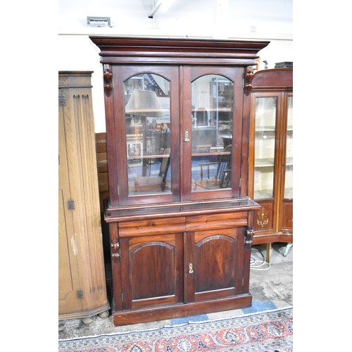 574 - A Victorian Mahogany Library Bookcase with Two Drawers Over Cupboard Base, Glazed Shelved Top Sectio... 