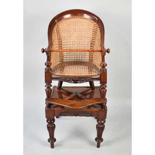 105 - A Victorian Mahogany Childs High Chair with Cane Seat and Back, Front Foot Rest and Turned Reeded Su... 