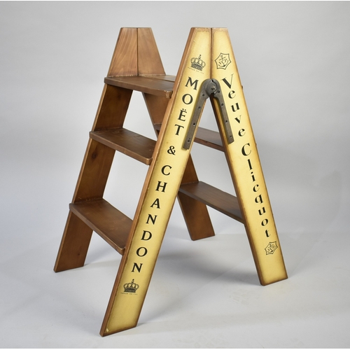 177 - A Modern Three Step Stepladder Decorated with Various Brands of Champagne, 82cms High