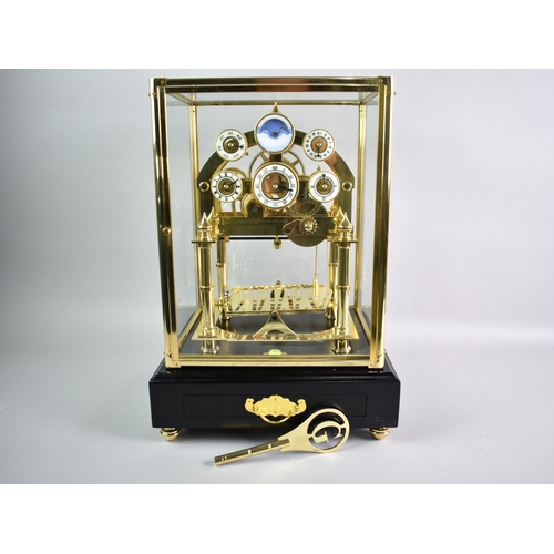 182 - A Modern Congreve Fusee Rolling Ball Clock with Six Enamelled Dials, in Brass Glazed Case with Base ... 