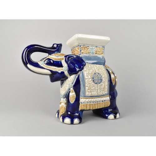 183 - A Modern Blue Glazed Indian Ceramic Stool in the Form of an Elephant, 33cms Long