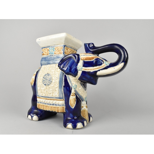 183 - A Modern Blue Glazed Indian Ceramic Stool in the Form of an Elephant, 33cms Long