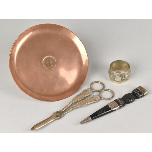 213 - A Pair of Silver Plated Grape Scissors, Scottish Faux Dubh, White Metal Napkin Ring and Copper Dish