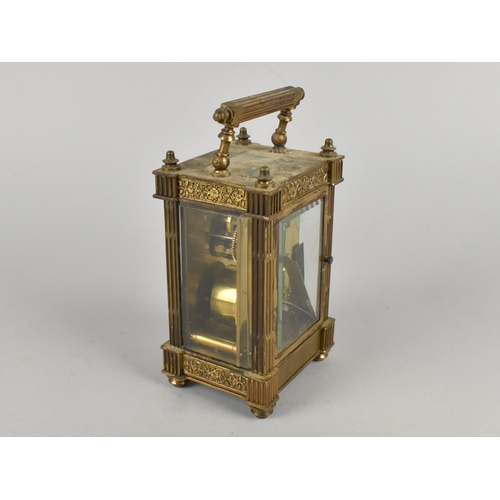 57 - An Aesthetic Movement Brass Cased French Carriage Clock, No Key but Working Order, 18cms High