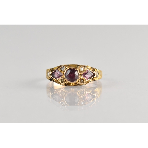 9 - A 19th Century Almandine Garnet and Seed Pearl Ring, Central Round Cut Stone Measuring 3.8mm Diamete... 