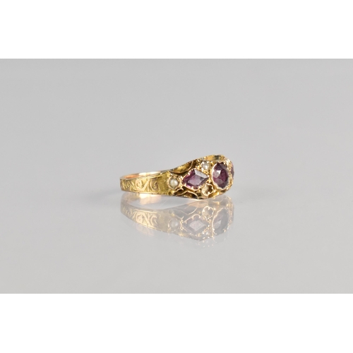 9 - A 19th Century Almandine Garnet and Seed Pearl Ring, Central Round Cut Stone Measuring 3.8mm Diamete... 