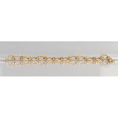 46 - A 9ct Gold Bracelet, Mixed Twisted Oval Links, Stamped to Links and Bolt Ring Clasp 9.375, 25mm Long... 