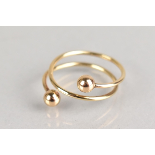 51 - A 9ct Gold Spiralled Ring with Sphere Terminals, Stamped to the Interior for Birmingham 1985 and wit... 