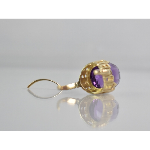 26 - A Modern Gold Metal and Amethyst 'Taj Mahal' Ring, Faceted Domed Amethyst Measuring 12.7mm Diameter ... 