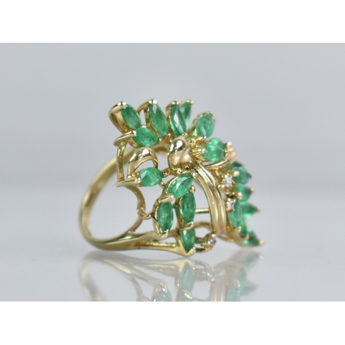 28 - A Modern 9ct Gold, Emerald and Diamond Ladies Dress Ring, Marquise Cut Emeralds Measuring 4.7mm by 2... 