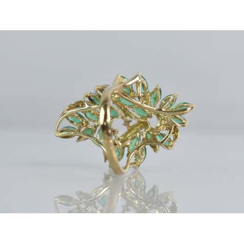 28 - A Modern 9ct Gold, Emerald and Diamond Ladies Dress Ring, Marquise Cut Emeralds Measuring 4.7mm by 2... 