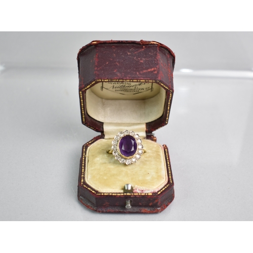 3 - A Diamond and Amethyst Set 18ct Gold Ring, Central Oval Cut Stone Measuring 9.4mm by 11.5mm, Bezel S... 