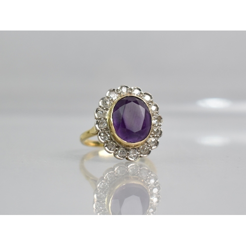 3 - A Diamond and Amethyst Set 18ct Gold Ring, Central Oval Cut Stone Measuring 9.4mm by 11.5mm, Bezel S... 