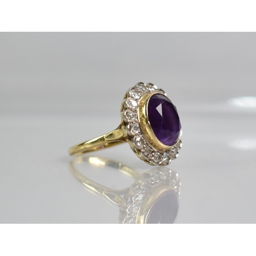 3 - A Diamond and Amethyst Set 18ct Gold Ring, Central Oval Cut Stone Measuring 9.4mm by 11.5mm, Bezel S... 