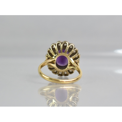 3 - A Diamond and Amethyst Set 18ct Gold Ring, Central Oval Cut Stone Measuring 9.4mm by 11.5mm, Bezel S... 