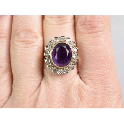 3 - A Diamond and Amethyst Set 18ct Gold Ring, Central Oval Cut Stone Measuring 9.4mm by 11.5mm, Bezel S... 