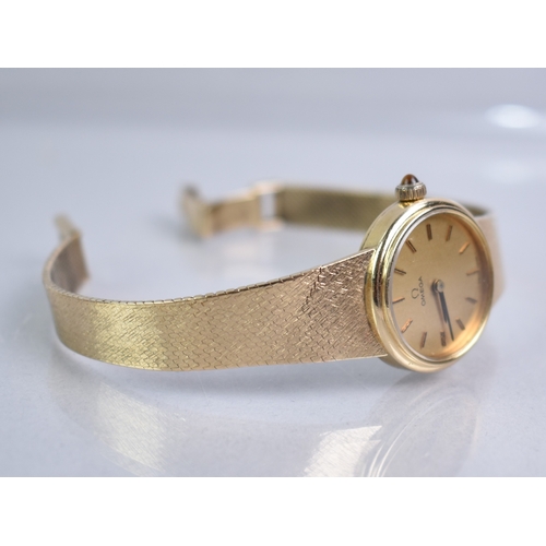 77 - A 1970s Boxed Ladies Omega Mechanical Wrist Watch, Round Gold Face with Stick Hands and Hour Indicat... 