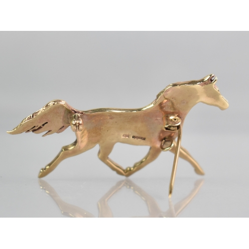 14 - A 9ct Gold Brooch, Horse Trotting, Sheffield 1998 with Makers Mark AA, 56mm Long, 12.9gms,