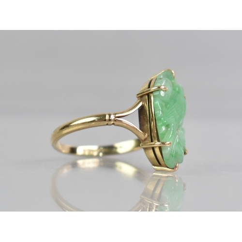 37 - A Jadeite and 9ct Gold Ring, Pierced and Carved Jadeite Panel Measuring 20mm by 10mm, Depicting Spar... 