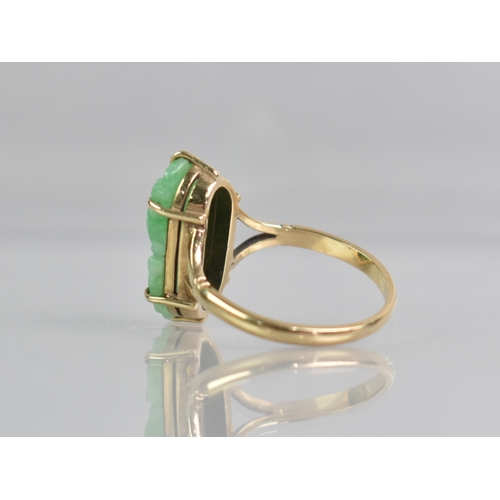 37 - A Jadeite and 9ct Gold Ring, Pierced and Carved Jadeite Panel Measuring 20mm by 10mm, Depicting Spar... 