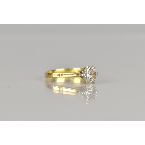 8 - An 18ct Gold and Diamond Solitaire Ring, Central Round Cut Stone Approx 6.2mm Diameter, Supported in... 