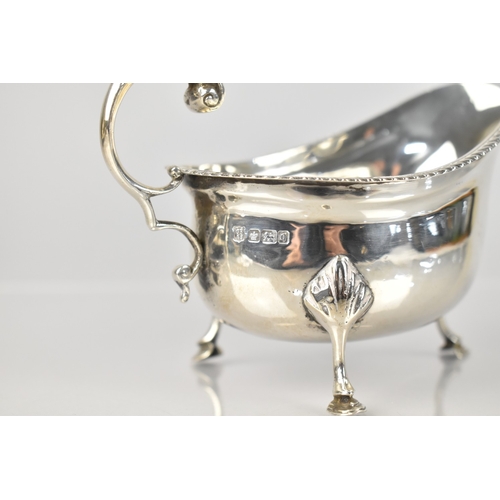 216 - An Edward VII Silver Sauce Boat by Cooper Brothers & Sons Ltd, Sheffield Hallmark 1908. 9cm High, 14... 