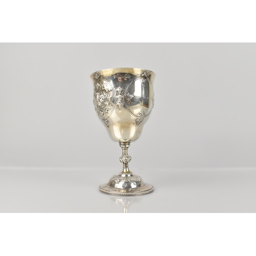 197 - A Victorian Silver Presentation Goblet with Floral and Fleur De Lys Motif Repoussé Decoration, Inscr... 